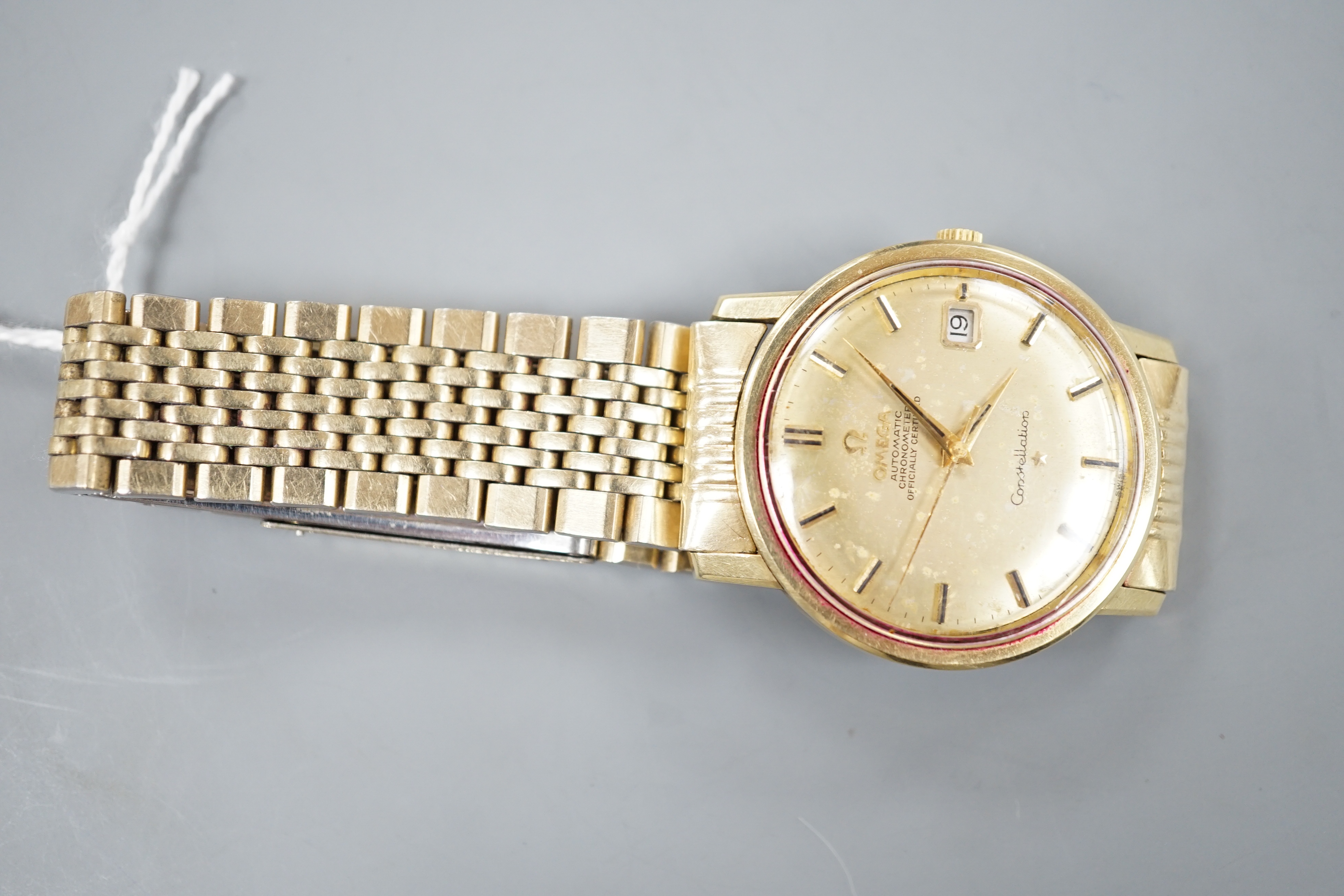 A gentleman's steel and gold plated Omega constellation automatic wrist watch, on an Omega gold plated bracelet.